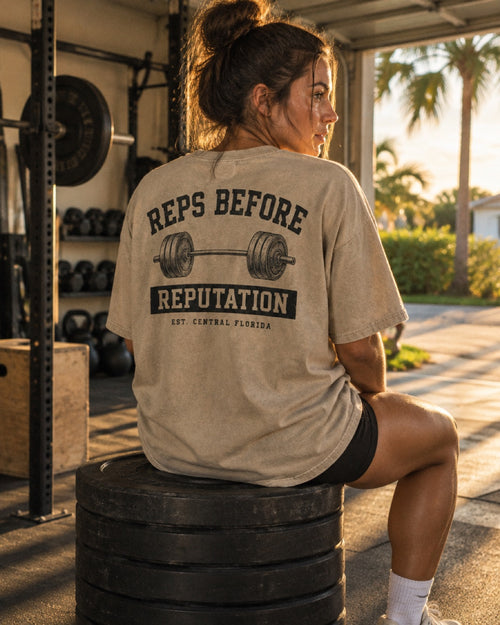 Reps Before Reputation tee worn in a Florida garage gym