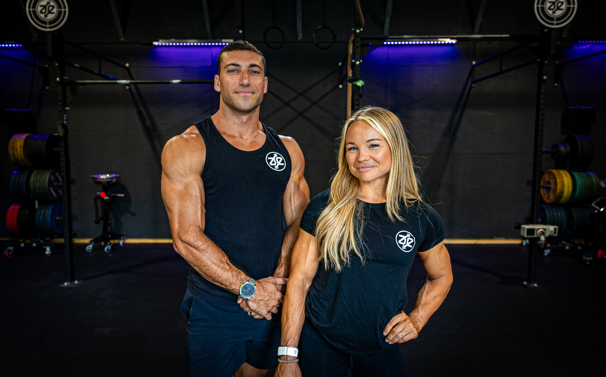 Ari and Emily standing together in the A&E Fitness gym